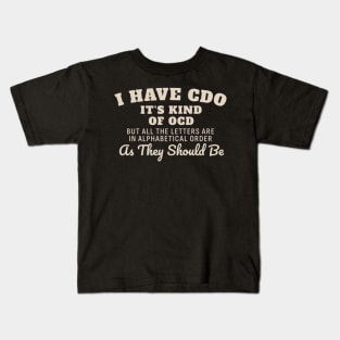 I have CDO It’s kind of OCD but all the letters are in alphabetical order as they should be Kids T-Shirt